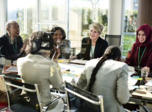 Making the Right In-Country Decisions, executives around a table talking